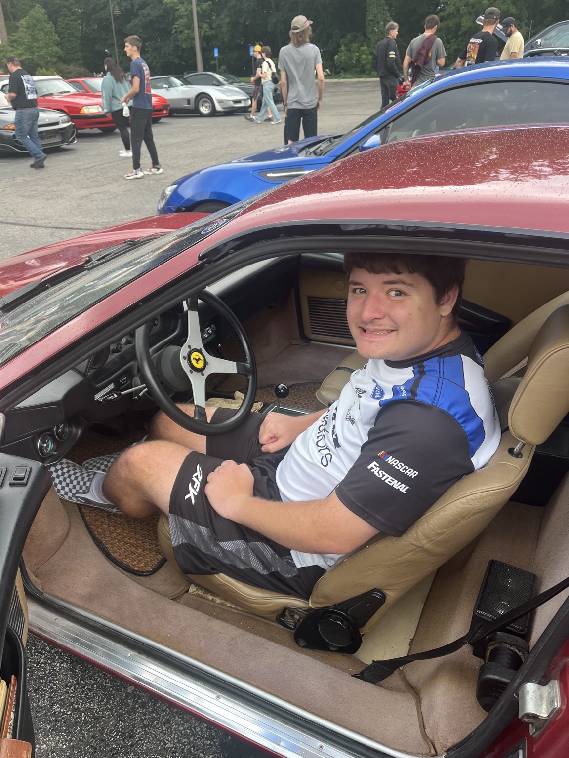 Charlie today in a Ferrari